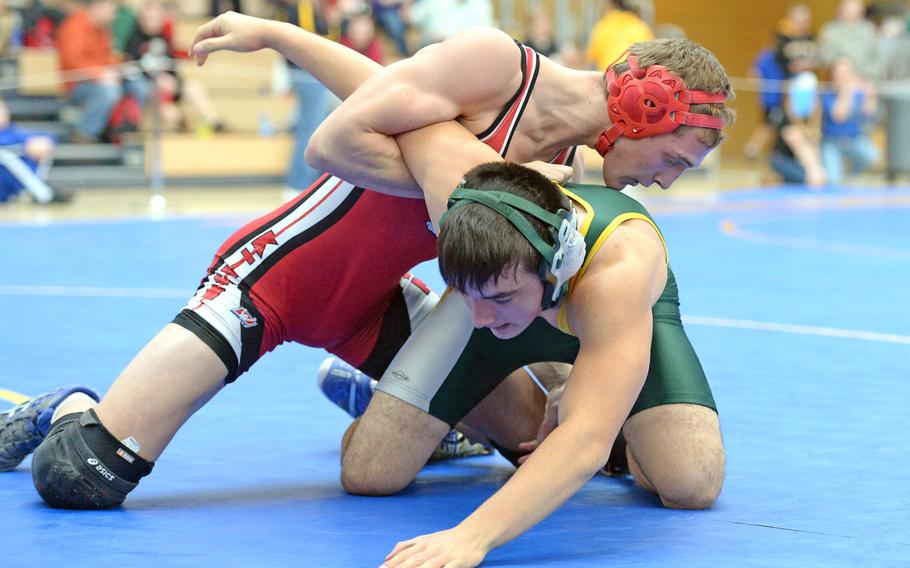 Kaiserslautern's Arvin Hrushka, left, beat Alconbury's Nick Dufresne in a 170-pound match in first round action on the first day of the DODDS-Europe wrestling championships in Wiesbaden, Germany, Friday, Feb. 14, 2014.





