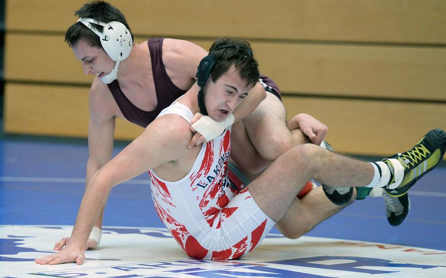 Vilseck's Will Peters, left, beat Lakenheath's Dillon Thompson in a 160-pound match in first round action on the first day of the DODDS-Europe wrestling championships in Wiesbaden, Germany, Friday, Feb. 14, 2014.





