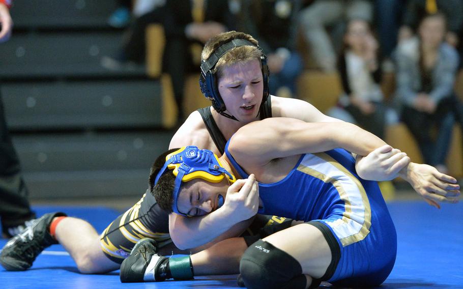 Patch's Robert Call, top defeated Wiesbaden's Matthew Hall to win the 132-pound title at the DODDS-Europe wrestling championships in Wiesbaden, Germany, Saturday, Feb. 15, 2014.






