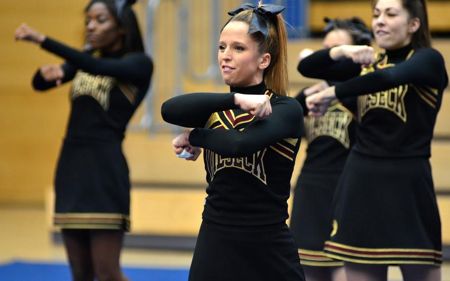 Members of the Vilseck Falcons cheer squad perform at the DODDS-Europe cheerleading championships in Wiesbaden, Germany, Saturday, Feb. 22, 2014.  The Falcons placed third within Division I in the 2014 Cheer competition. 