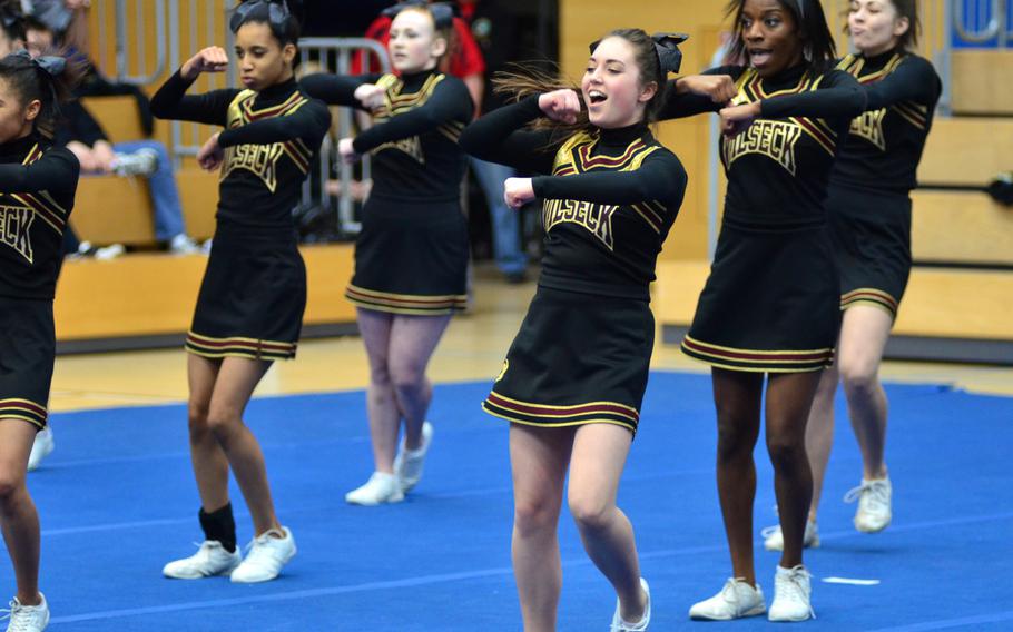 Members of the Vilseck Falcons cheer squad perform at the DODDS-Europe cheerleading championships in Wiesbaden, Germany, Saturday Feb. 22, 2014.  The Falcons placed third within Division I in the 2014 Cheer competition.