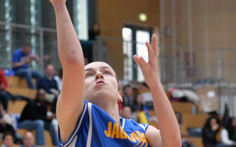 Sigonella's Katie Caubie goes in for a basket early in the Division III girls final at the DODDS-Europe basketball championships in Wiesbaden, Germany, Saturday, Feb. 22, 2014. Brussels won 38-31 in OT. 