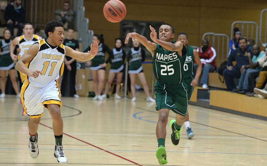 Terrell Staten passes the ball up the court as Vicenza's Randall Bagtas defends in the Division II title game at the DODDS-Europe basketball championships in Wiesbaden, Germany, Saturday, Feb. 22, 2014. Vicenza beat Naples 75-45 for the title.