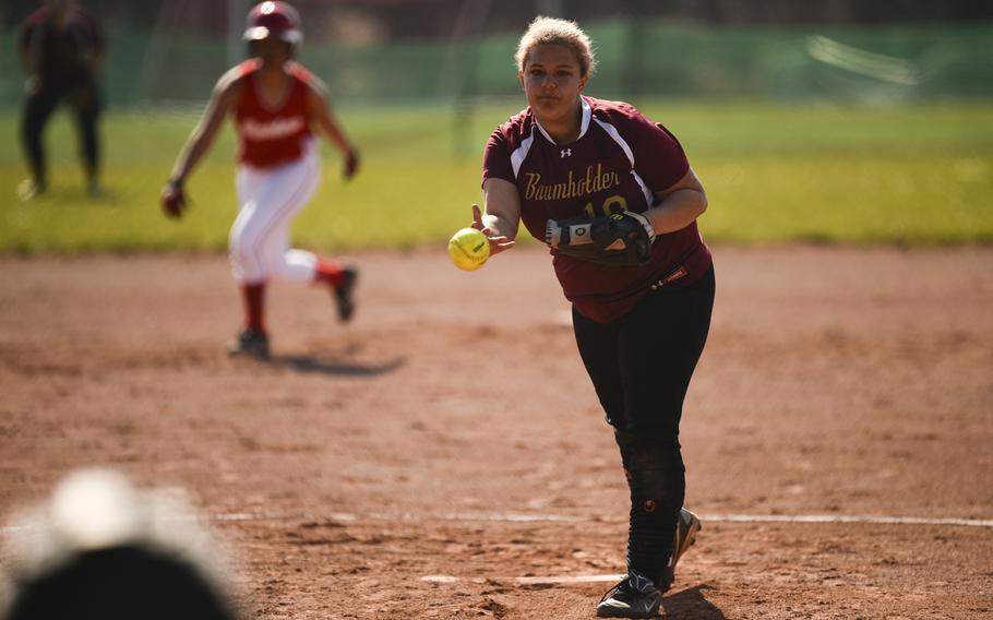 Baumholder's Megan Brown pitches in the first game of a double header against Kaiserslautern Saturday, March 29, 2014 at Kaiserlautern, Germany.