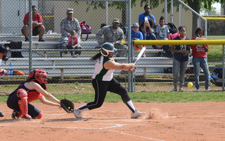 Naples' Davina Gutierrez hits a line drive Friday, against Aviano during the first game of a doubleheader at Aviano Air Base, Italy. Naples won both games 19-10, 18-12. 