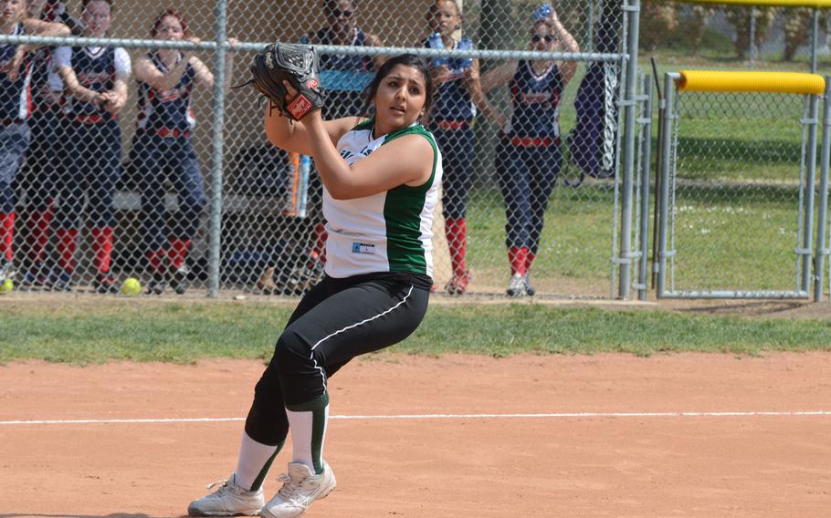 Naples' Davina Gutierrez stops a line drive and looks to first to throw the ball Friday, against Aviano during the second game of a doubleheader at Aviano Air Base, Italy. Naples won both games 19-10, 18-12. 