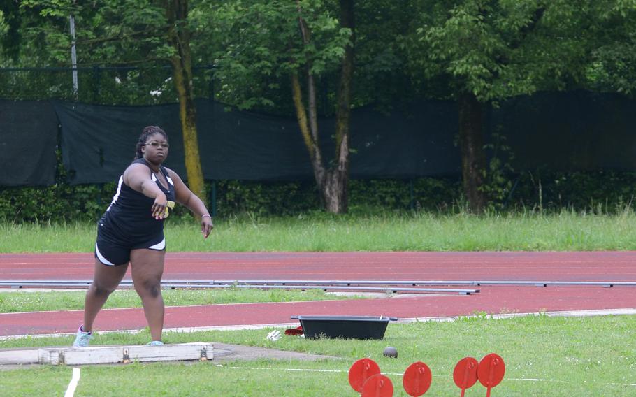 Vicenza's Eugenia Johnson tosses the shot put 28 feet .11 inches Saturday, during a track and field meet at Creazzo, Italy. Johnson took first in the event. 