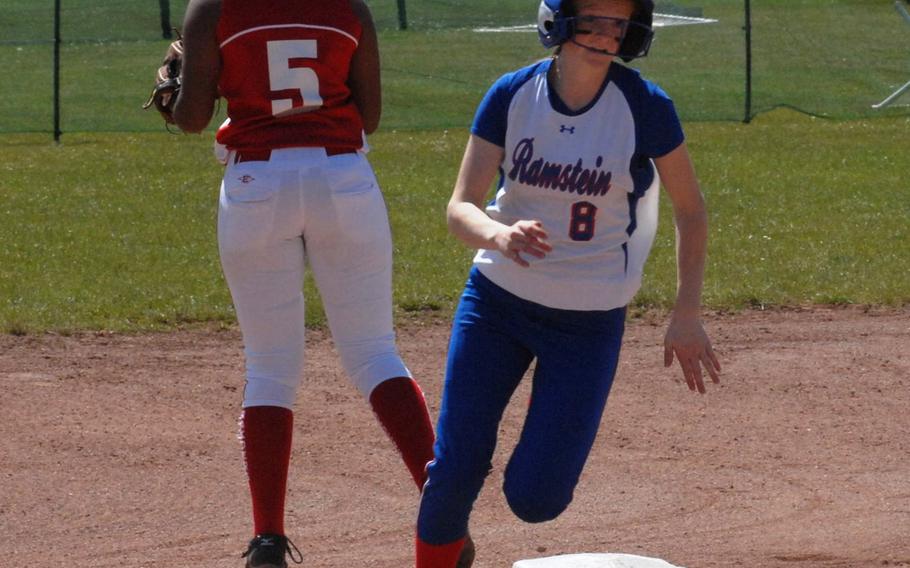 Ramstein's Sarah Wilhite rounds second base as Kaiserslautern's Tori Liggins waits for the throw from the outfield in the Royals' 17-7 victory Friday, May 16, 2014, at Kaiserslautern, Germany.