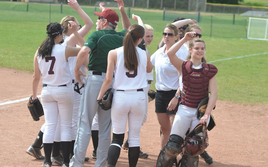 AFNORTH celebrates after closing the third inning with a substantial lead against Alconbury during the first day of pool play in the DODDS-Europe softball championships in Kaiserslautern, Germany on May 22, 2014.  Alconbury beat AFNORTH 9-7.