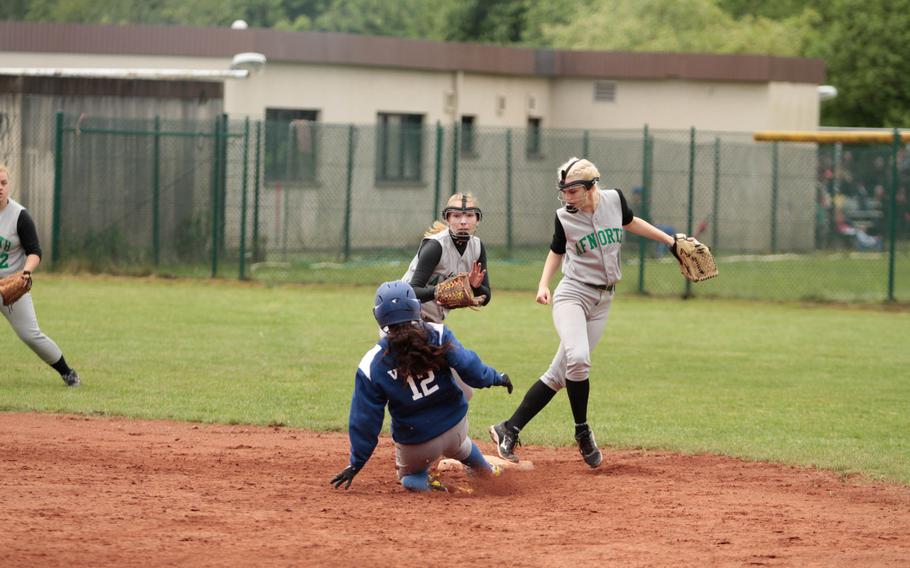Rota's Ophelia Vella slides into second after slapping a looping double that dropped between right and center field during day two of pool play in the DODDS-Europe softball championships Friday. 
