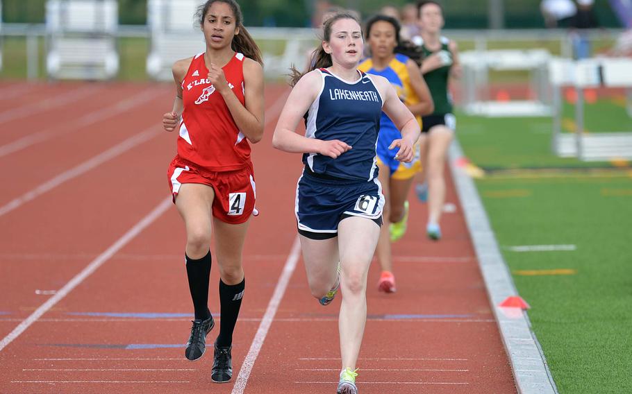 Lakenheath's McKayla Boden leads Kaiserslautern's Shanice Harmon into the final lap of the girls 3200-meter run at the DODDS-Europe track and field championships in Kaiserslautern, Germany, Friday, May 23, 2014. Boden won the race in 12 minutes, 8.27 seconds.



