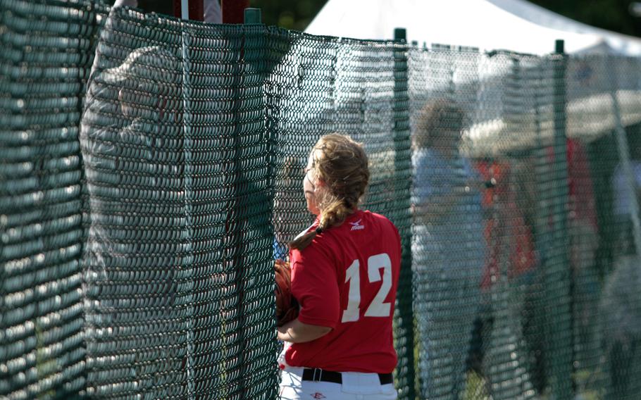Kaiserslautern's Emily Hickam watches as one of two Ramstein home runs in one inning sails over the fence in the quarterfinal matchup in the DODDS-Europe softball championships Friday. 