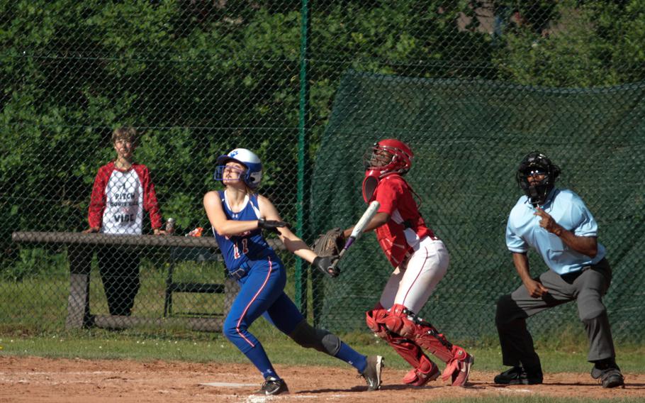 Ramstein's Zania Sterling watches as a well-hit ball sails over the centerfield fence in the Royals' quarterfinal match Friday against Kaiserslautern in the DODDS-Europe softball championships. 