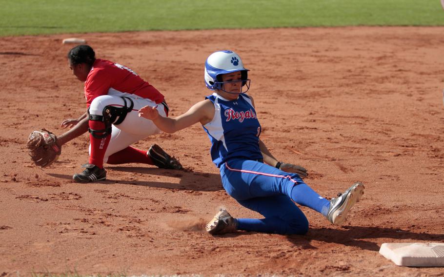 Ramstein's Savannah Brooks slides into third after outrunning a short throw from the outfield in the Royals' 9-5 quarterfinal win over Kaiserslautern in the DODDS-Europe softball championships Friday. 