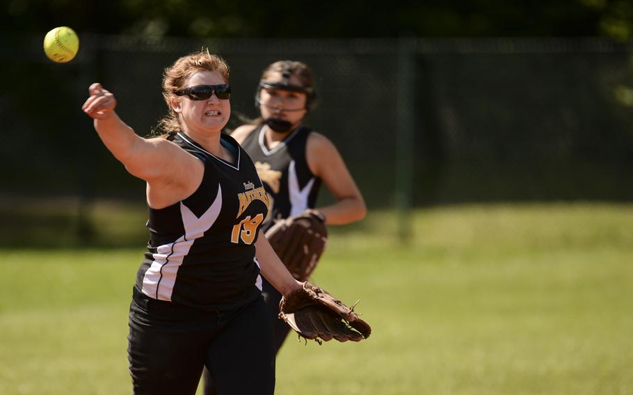 Patch's Cosette Puckett makes a throw to first against Ramstein on Saturday, May 24, 2014, in the DODDS-Europe Division I championship game at Ramstein, Germany.