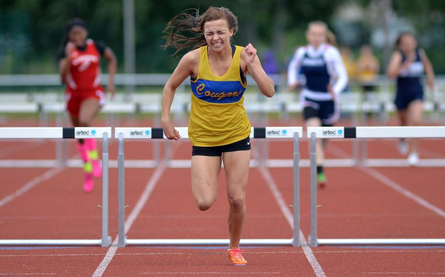 Ansbach's Mykala Bazen pushes herself to the finish line on the way to setting a new DODDS-Europe record in 300-meter hurdles. She won in 44.71 seconds.