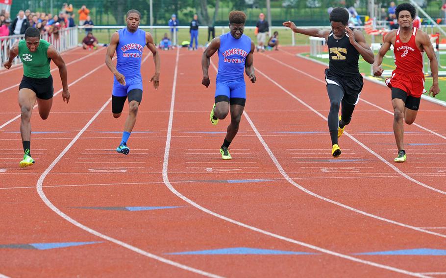 Cameron Copeland of Naples, left, won the 100-meter dash in 11.33 seconds ahead of Vicenza's Karl Bulgin, second from right and Kaiserslautern's David Zarczny, right. Ramstein's Gregory Desulme, center, was fourth and Johnny Pack, 2nd from left, was sixth.