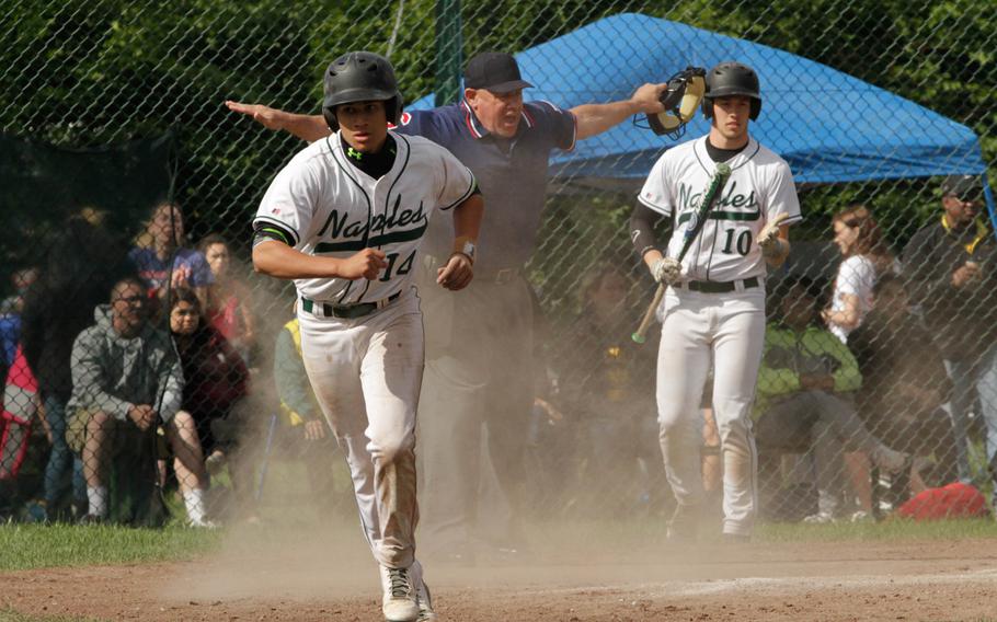 Naples' Kory McKinney runs back to the dugout after scoring a run in the Wildcats' 11-4 title win Saturday over Vicenza in the DODDS-Europe baseball championships at Ramstein Air Base, Germany. 