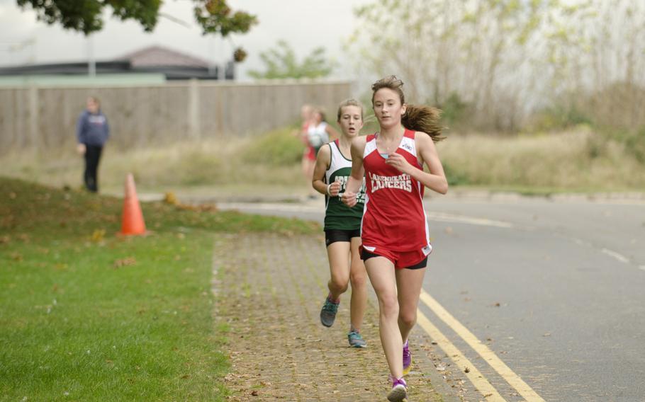 Lakenheath's Mara Lopes runs her second lap Saturday, Oct. 4, 2014 during a cross country meet at RAF Lakenheath, England. Lopes finished second with a time of 22 minutes, 42 seconds.