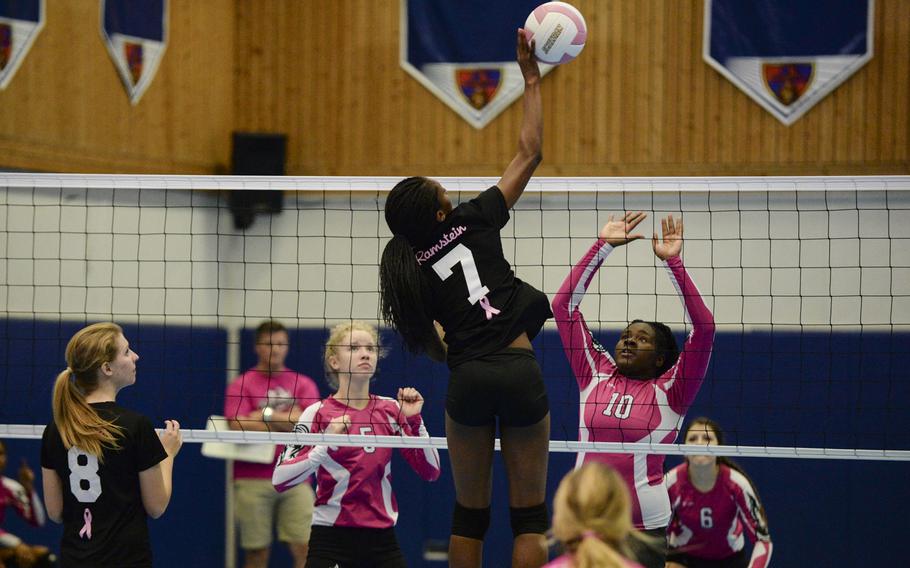 Ramstein's Danee Lawrence spikes the ball Saturday, Oct. 4, 2014 during a volleyball match against Vilseck at Ramstein, Germany.
