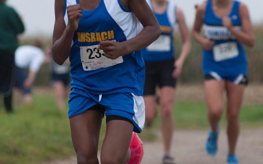 Mikalia Bell crosses the finish line during the cross-country meet at Ansbach, Germany on Oct. 11, 2014. Bell finished with a time of 23 minutes, 48.25 seconds. 