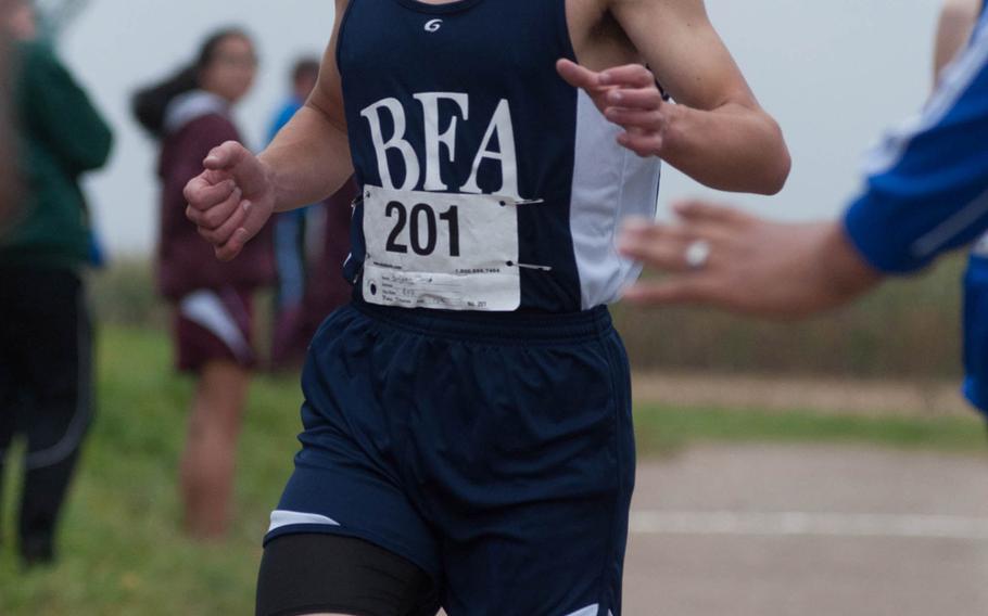 Jacob Benjamin finished first for both Black Forest Academy and the boy's cross-country meet with a time of 17 minutes, 52.23 seconds at Ansbach, Germany on Oct. 11, 2014. 