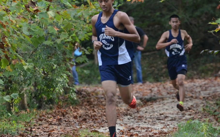 Aviano's Jaylen Esposito followed by Francis Apalisok participate in a cross country meet Saturday against Vicenza at San Giovanni, Italy. 