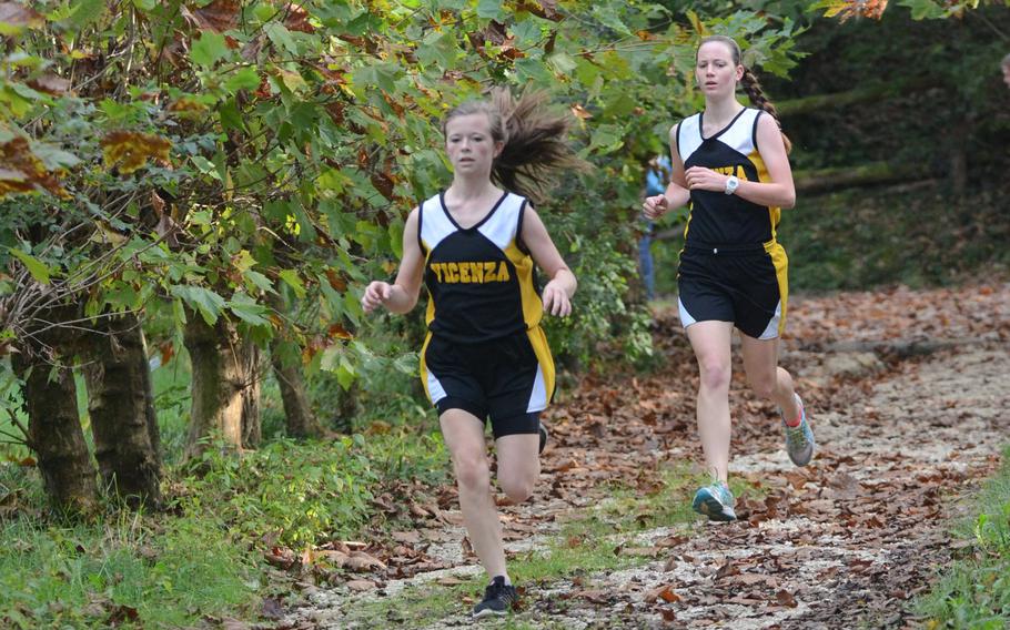 Vicenza cross country runner Nicole McCollaum followed by Erin Wright participate in a meet Saturday against Aviano at San Giovanni, Italy. McCollaum finished second with a time of 24 minutes, 3 seconds and Wright finished third with 24:41.