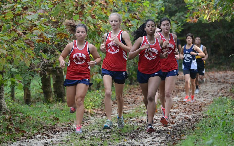 Aviano cross country runners Elyse Slabaugh, Hannah Stone, Arie Fowler and Madison Summey participate in a meet Saturday against Vicenza at San Giovanni, Italy. 