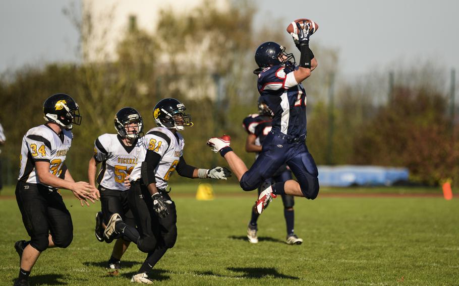 Bitburg's John Blake makes an athletic catch against Vicenza on Saturday, Oct. 18, 2014, at Bitburg, Germany.