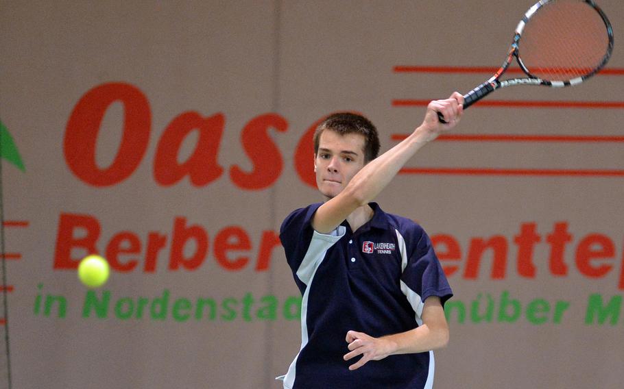Lakenheath's Nathan Short returns a shot from Nathan Witty of Hohenfels in an opening day match at the DODDS-Europe tennis championships in Wiesbaden, Germany, Thursday, Oct. 23, 2014. Short won 6-0, 6-0.