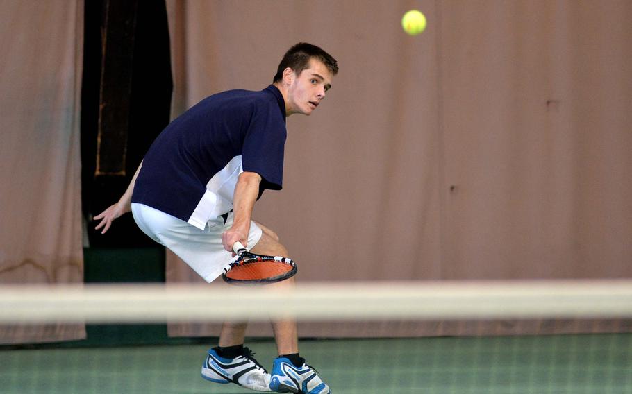 Lakenheath's Nathan Short watches his ball sail over the net in a semifinal match at the DODDS-Europe tennis championships in Wiesbaden, Germany, Friday Oct. 24, 2014. Short lost the match to ISB's Fabian Sandrup Selvik 6-0, 6-1 and will face Marymount's Ting Lin in Saturday's third-place match.