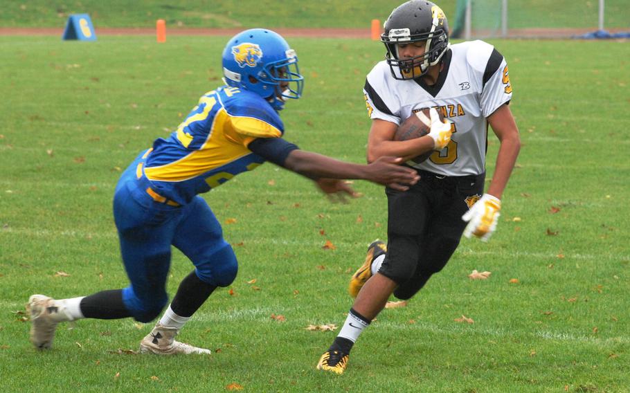 Ansbach's Roger Brownell pursues Vicenza ballcarrier Adrian Guerrero in Ansbach's 32-12 victory Saturday at Gray Stadium in Ansbach, Germany.
