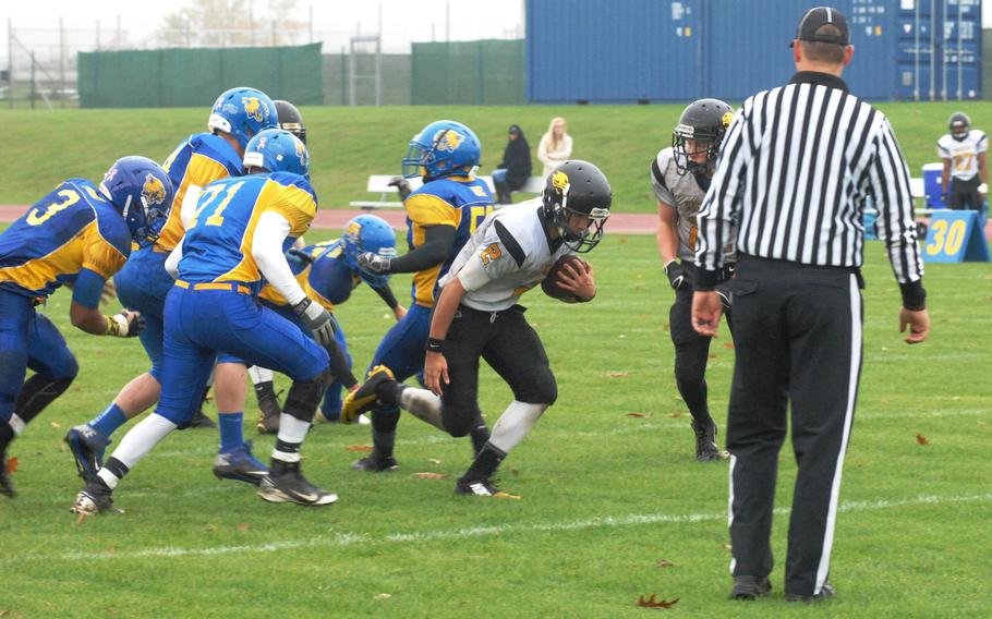 Vicenza quarterback Mario Molina runs in for a third-quarter touchdown, Vicenza's first of the game, in Ansbach's 32-12 victory Saturday at Gray Stadium in Ansbach, Germany.