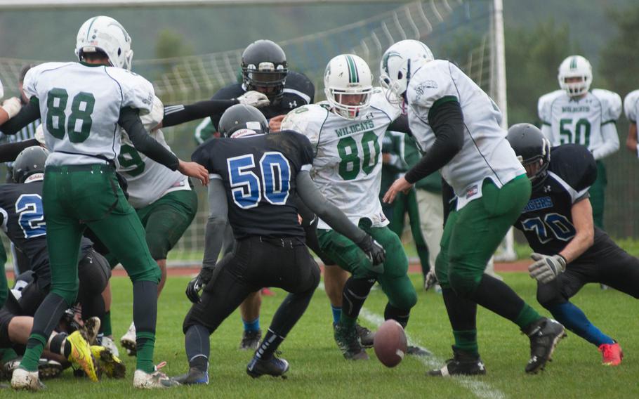 Slippery conditions lead to turnovers for both Naples and Hohenfels on Saturday during a quarterfinal game at Hohenfels, Germany. 