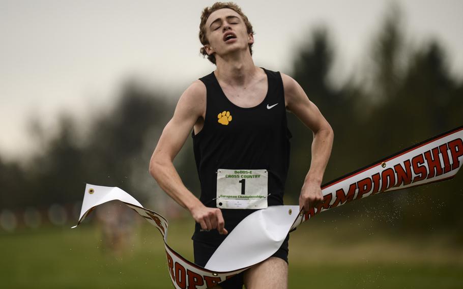 Patch's Mitchell Bailey crosses the finish line to win his second consecutive DODDS-Europe cross country championship race at the Rolling Hills Golf Club in Baumholder, Germany, Saturday, Oct. 25, 2014.