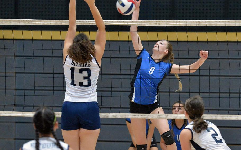 Rota's Janae Curtis hits the ball against Bitburg's Elise Rasmussen in a Division II semifinal at the DODDS-Europe volleyball championships in Ramstein Friday, Oct. 31, 2014. Rota won the match 25-13, 21-25, 25-19, 25-23 to advance to Saturday's finals against Aviano.