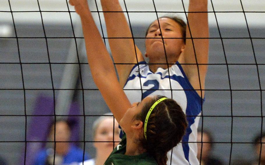 Wiesbaden's Leah Rojas, rear,  battles at the net with Keylee Soto of Naples  in the Division I final at the DODDS-Europe volleyball championships in Ramstein, Germany, Saturday, Nov. 1, 2014. Rojas has been named the Stars and Stripes volleyball Athlete of the Year.