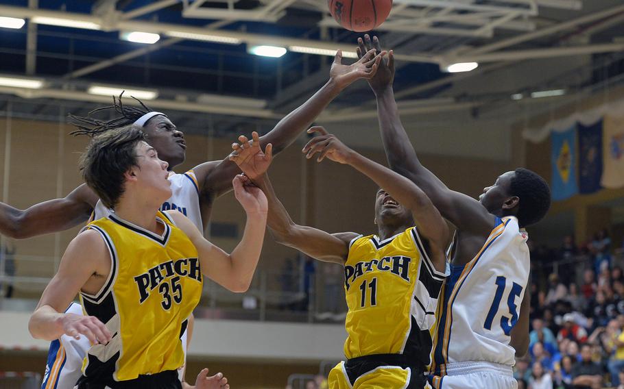 Patch Panthers and Wiesbaden Warriors fight for a rebound in last seasons Division I final at the DODDS-Europe basketball championships. Both teams are set to participate in a holiday tournament in Stuttgart during the Christmas break.