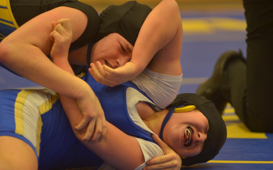 Ansbach's Kelly McKaskill gets the better of Wiesbaden's Jordan Reed in the 132-pound weight class at a wrestling tournament Saturday, Dec. 13, 2014 in Wiesbaden, Germany.  McKaskill eventually won the match in a major 21-7 decision.
