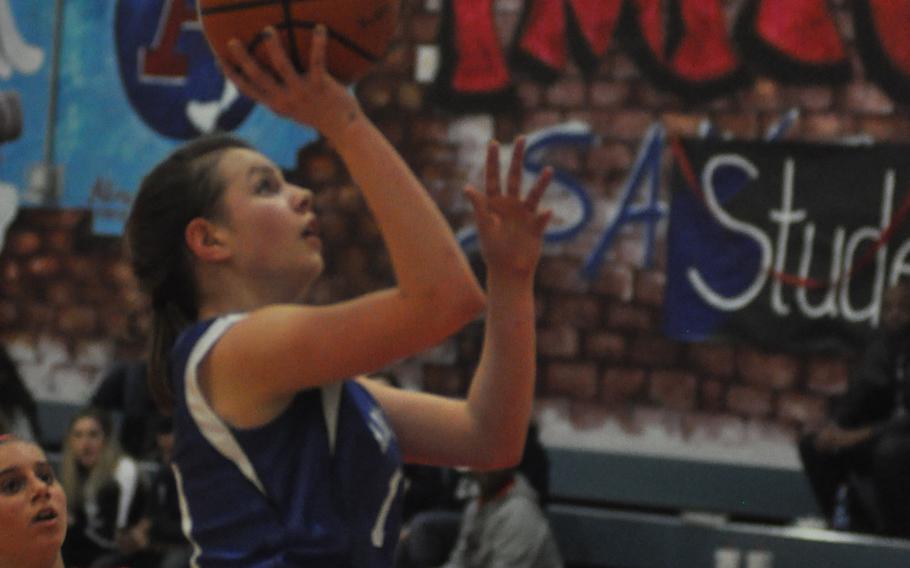 Hohenfels' Shelby Atkinson scores two of her 18 points Friday night in the Tigers' 41-40 loss to American Overseas School of Rome at Aviano Air Base, Italy.