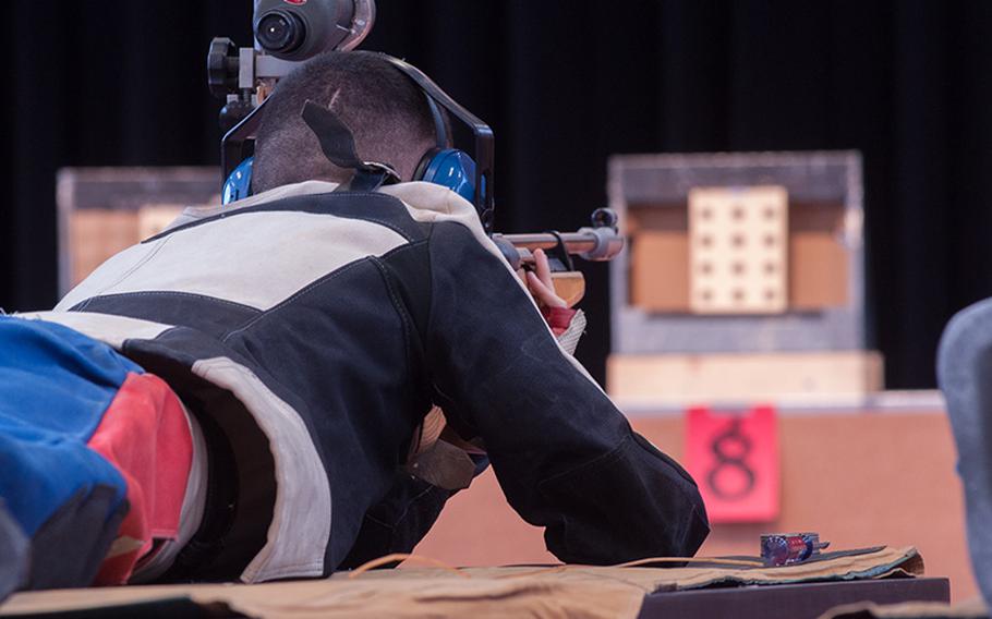 Daniel Sharp, a Wiesbaden shooter, aims in during the final iteration of the 2015 DODDS European Marksmanship Championships at Vilseck, Jan. 31, 2015.
