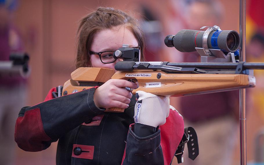Hohenfels marksman Melanie DePuy takes aim during the standing portion of her iteration during the 2015 DODDS European Marksmanship finals at Vilseck, Jan. 31, 2015.