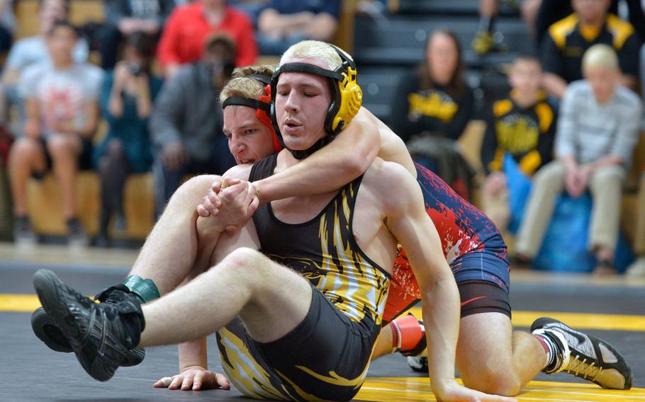 Patch's Robert Call, right, beat Lakenheath's Zackary Adamson to win the 138-pound title at the DODDS-Europe wrestling championships in Wiesbaden, Germany, Saturday, Feb. 14, 2015.