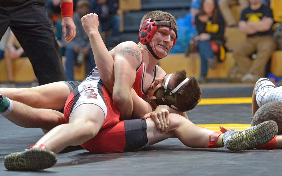 Kaiserslautern's Bradly Lemon, top, defeated Vicenza's Seth Shields to take the 170-pound title at the DODDS-Europe wrestling championships in Wiesbaden, Germany, Saturday, Feb. 14, 2015.