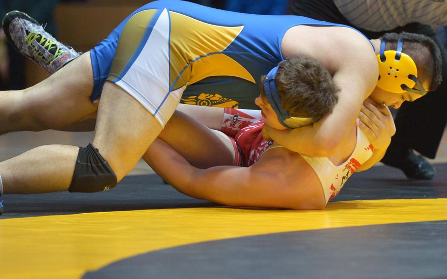 Wiesbaden's Hunter Lunasin defeated Lakenheath's Colten Menges in the 220-pound final at the DODDS-Europe wrestling championships in Wiesbaden, Germany, Saturday, Feb. 14, 2015.