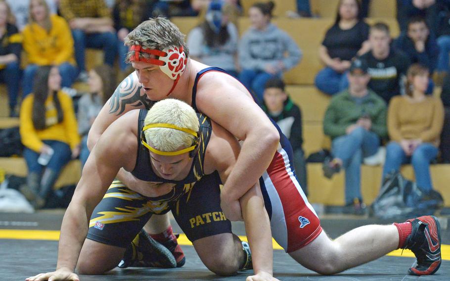 Lakenheath's Casey Fairchild, top, beat Patch's Brian Mogavero in the 285-pound title at the DODDS-Europe wrestling championships in Wiesbaden, Germany, Saturday, Feb. 14, 2015.