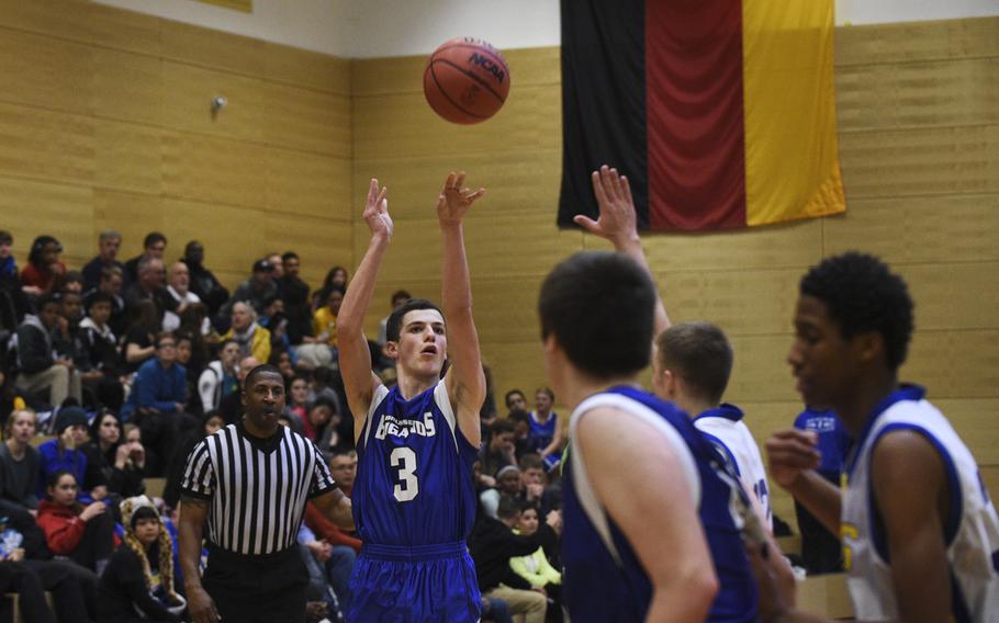 Brussels' Michael DeFazio shoots a three pointer against Sigonella in the semifinals of the DODDS-Europe tournament, Friday, Feb. 20, 2015.