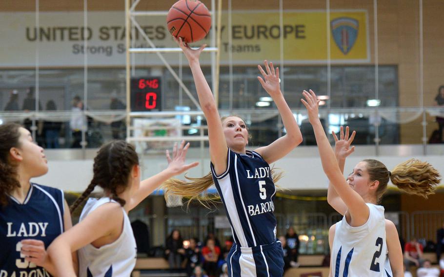 Bitburg's Saorise Matthews get off a shot against Black Forest Academy in the girls Division II championship game in Wiesbaden, Germany, Saturday Feb. 21, 2015. Bitburg defeated BFA 34-27 for the title.