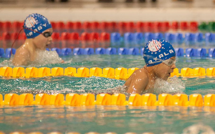 Kaiserslautern's Markos Ayala leads teammate Sam Grady during the boys 8 and under 200meter individual medley during the final day of the 2015 European Forces Swim League championships, March 1, 2015. Ayala won that race with a time of 3 minutes, 39.85 seconds.